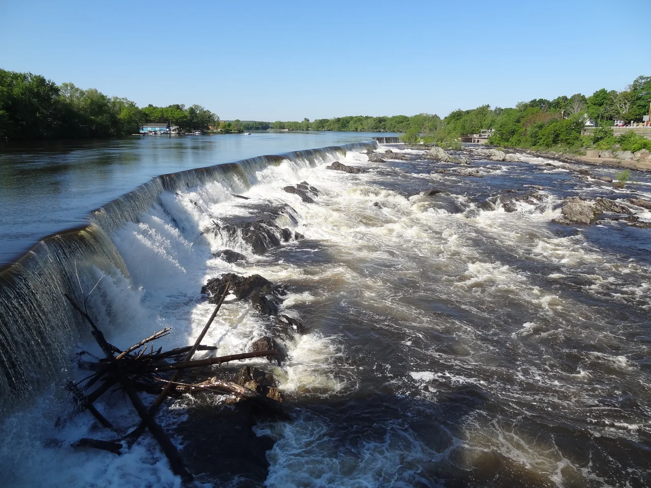 Pawtucket Falls viewed from the northeast side of the Pawtucket Gatehouse. Located near the southeast end of the O'Donnell Bridge in Lowell, Massachusetts.