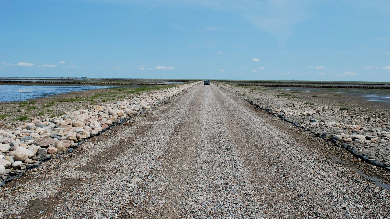"Låningsvejen" Mandø is barely accessible at high tide over an unpaved surface level causeway of about four kilometers in length that connects the island to the mainland.
